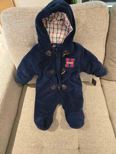 Brand new. Has a front zipper. Size 6-9 months. Pick up in Armdale. $20.