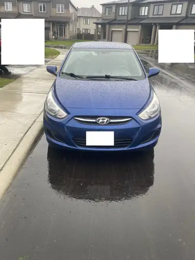 Bleu exterior, automatic transmission—this zippy sedan has been my trusty daily, piling on mostly hi...