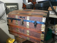 Antique leather in metal covered trunk