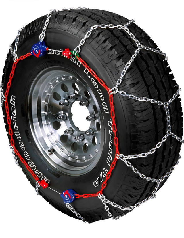 Brand new tire chains - self adjusting for 15”-24” wheels in Tires & Rims in St. Catharines