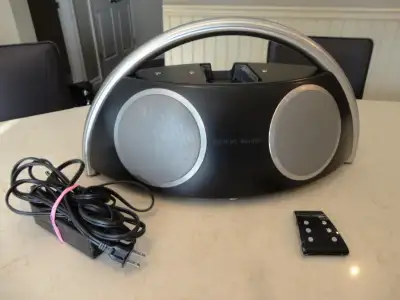 I am selling this Harman Kardon Go + Play iPod, iPhone Portable Music Speakers Dock System. It works...