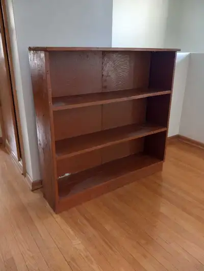 Solid wood bookcase. Measures: 36 inch long x 36 inch tall from floor x 8.5 inch deep. Asking $50 (R...