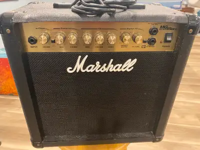 This is a used Marshall MG15DFX amp, perfect for practicing and small gigs, delivering that classic...