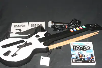 ALL FOR 30.00 PLEASE READ BELOW NINTENDO WII ROCK BAND 2 ACCESSORIES: 1 ROCK BAND 2 GAME - DISC IS I...