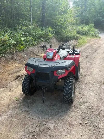 2013 Sportsman 500 HO. Just under 3000 km. Newer, more aggressive tires. Seat is in rough shape, jus...