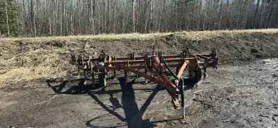 International Harvester 10’ main cultivator with two 3’ flip up wings on the sides. Works perfectly...