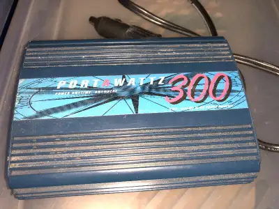 Porta Wattz 300. 300 watts invertor;convertit du 110Volts à partir du 12Volts de la prise de l'allum...