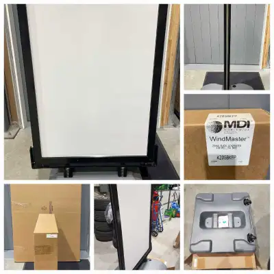 The WindMaster Classic Curb Sign with rolling base, Model 4205, is double-sided and has PosterGrip®...