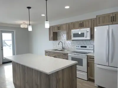 Newer three bedroom townhouse in Martensville in the Lake Vista neighborhood. Main floor features op...