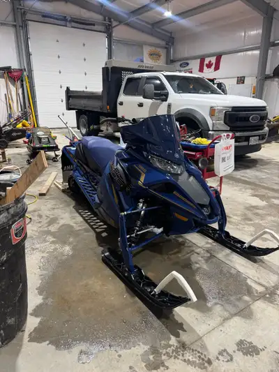 LOW KM turbo charged, studded track (3 a row) Upgraded bars, powerhouse snowmobile, Power steering,...