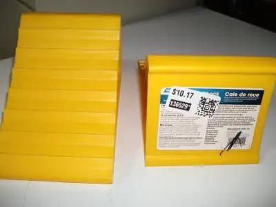2 Wheel Chocks - like New Cond. - $10.00 - SOLD 2 Trailer Jacks - $25.00 1 Set of 12 Levelling pads...