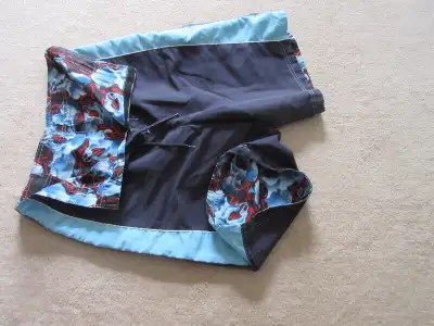 1-Girl's board shorts-Black/Blue-Size M-Asking $5 2-Board shorts-Reversible-Size 26/28-Asking $5 3-B...