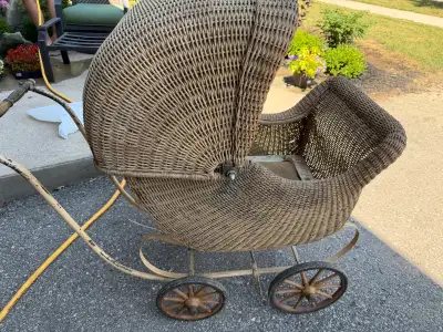 Great original condition antique wicker baby buggy.