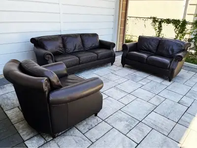 I am selling a set of high end 100% top grain real leather sofa set: the couch, the loveseat, and th...