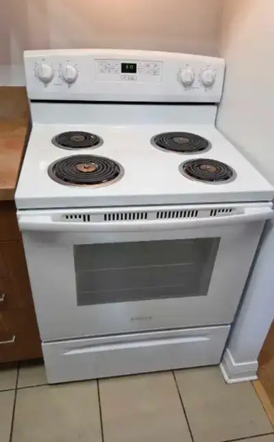 Amana coil stove work condition delivery available , View more