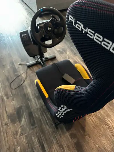 Logitech Wheel and Pedals with Redbull chair., View more