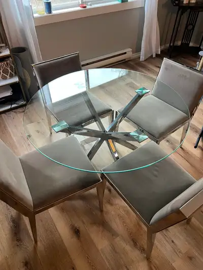 Dining table set for sale. Includes 1 table and 4 chairs., View more