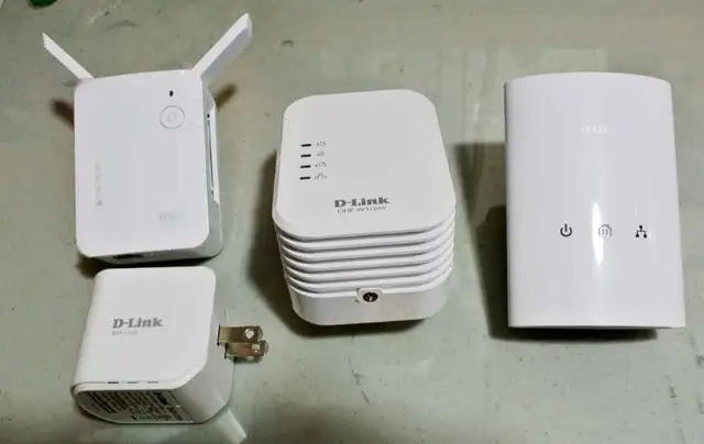 A set of D-Link range extenders and power line networking units in Networking in Cambridge - Image 2