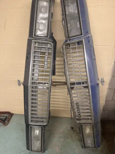 These are a couple of old Chevrolet front grills that would be perfect for restoring a classic Chevy...