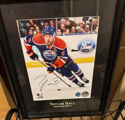 Taylor hall autographed 8x10