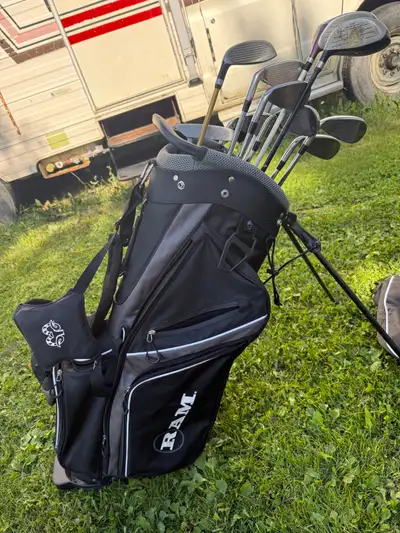 Jon Daley golf clubs with breast cancer driver , View more