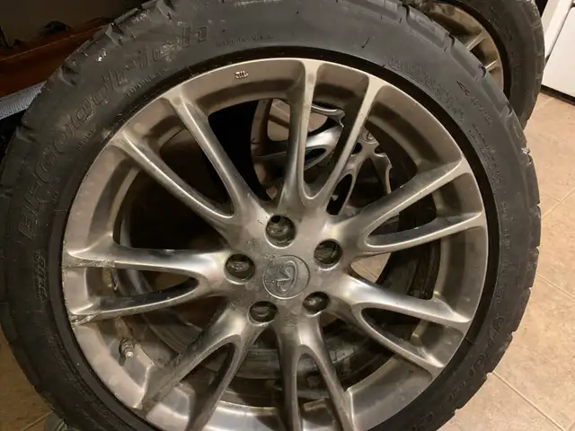 2007 G35s oem rims with all season tires in Tires & Rims in Oshawa / Durham Region - Image 2