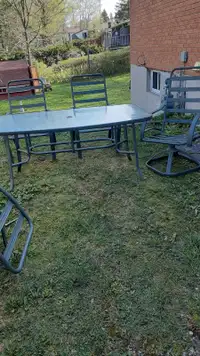 Patio table with 4 chairs and 2 swivel chairs
