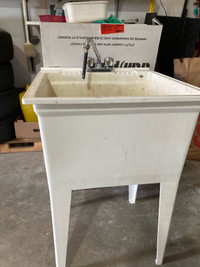 Laundry sink with the taps $80.