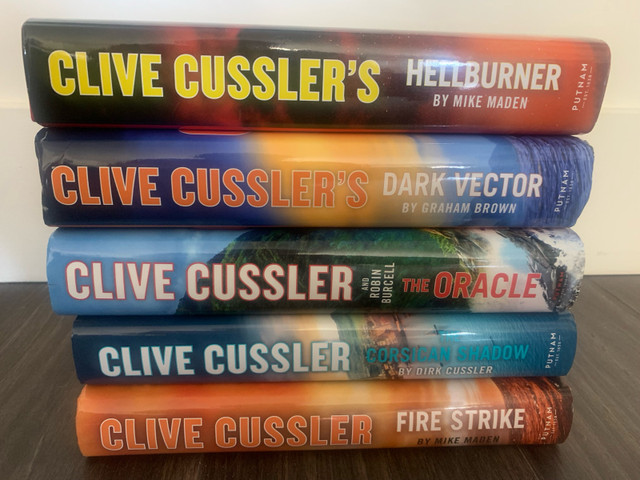 Books - Clive Cussler hard cover books  in Fiction in Bedford