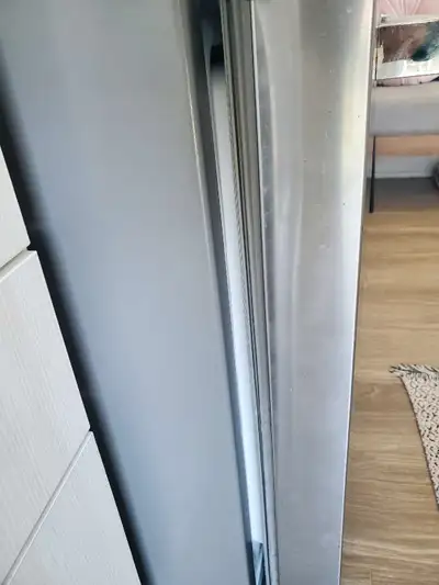 Appliance repair - fridge repair with door issue, View more