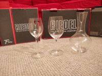 Riedel wine glasses, 6 red, 6 white, plus a decanter.