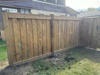 $52 a linear foot fence 6’ high fence 6x6 posts 2x6 cross members Post caps All pressure treated woo...