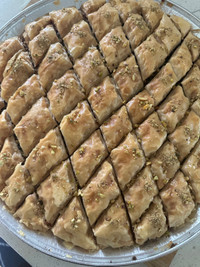 Big tray of baklava with pistachio 
