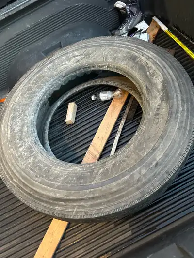 24.5 Michelin steer tire. 85% $300