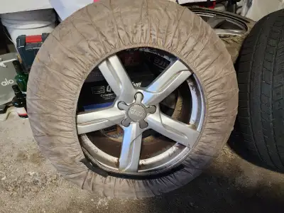 Audi Q5 winter tires and rims for sale Rims are in excellent condition Snow tires are 50% Size 235/6...