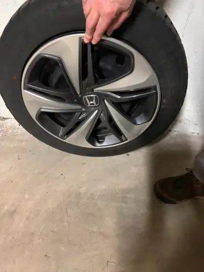 4 winter tires size, W215/55R16 plus steel rims and hubcaps for sale. Approximately 14000 km on the...