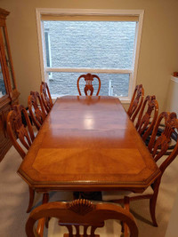 Dining room set/ Table with 8 chairs and hutch and buffet.