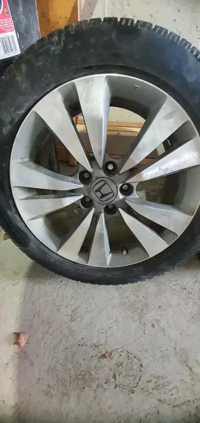 17 inch low profile aluminum rims and tires in amazing condition. 225/50/R17 ( 2x Pirelli & 2x BF Go...