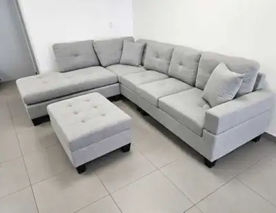 Urgent clearance sale on stylish grey couch, View more