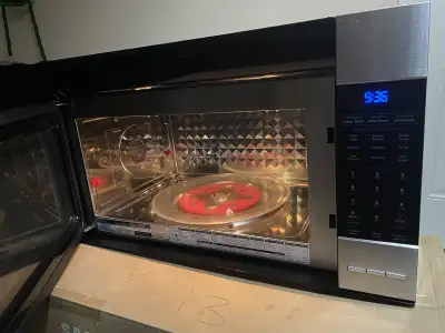 Kenmore Elite over the stove microwave for sale (30 inches wide). Everything works, clean, good ccon...