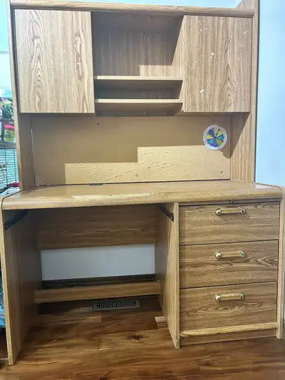 Solid wooden desk with lots of storage. 