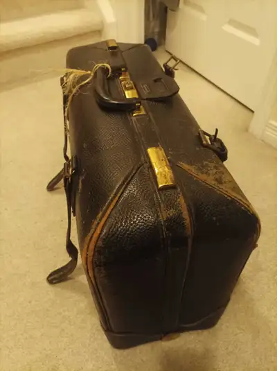 This vintage suitcase is ready for its next adventure! While it has seen better days, as you can tel...
