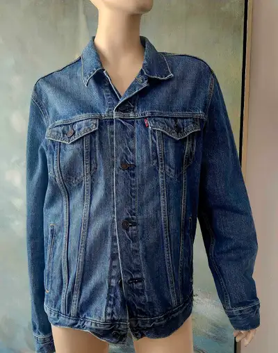 Levi's men's denim trucker jacket in a medium stonewash finish, View more