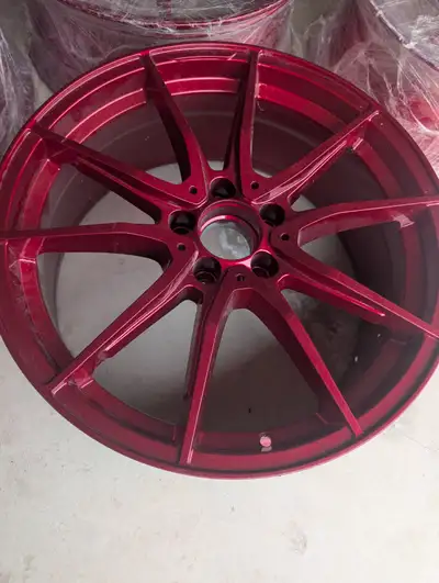 Set of 19 inch red rims, were bought for a Golf Gti