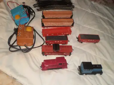 HO Train set with engine, caboose, tracks, transformer, more, View more