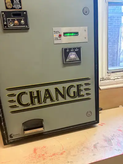 Standard change machine. Model SC62