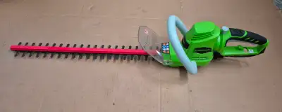 Greenworks electric hedge trimmer for sale, in excellent condition. 22-1/2" long. Cash deal.