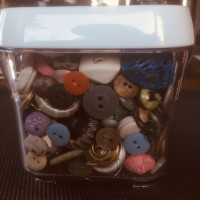 Vac N Store Container with assorted buttons 