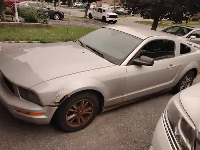 This Ford Mustang coupe is a classic American muscle car available in a silver exterior finish and i...