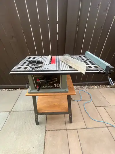 DELTA TABLE SAW AND STAND, View more